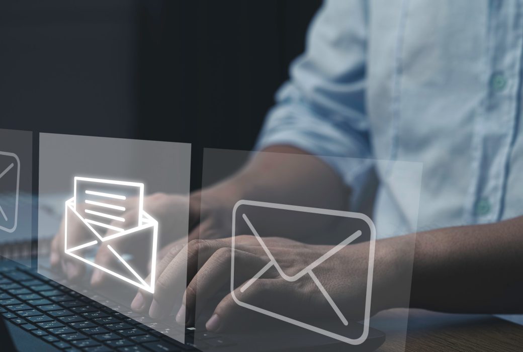 Businessman typing laptop computer to open and send email to customer, business contact and communication concept.