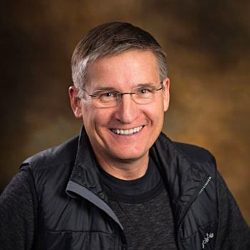 Ron Hessel smiling at the camera